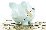 RTEmagicC 19109982brokenpiggybank.jpg